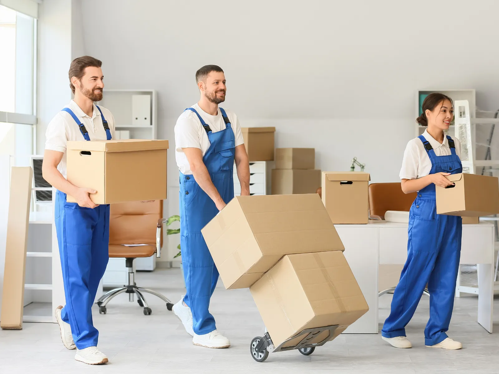 Professional moving company crew carefully loading a truck on a residential street — the kind of quality moving service that LeadGulls PPC campaigns help attract more customers to